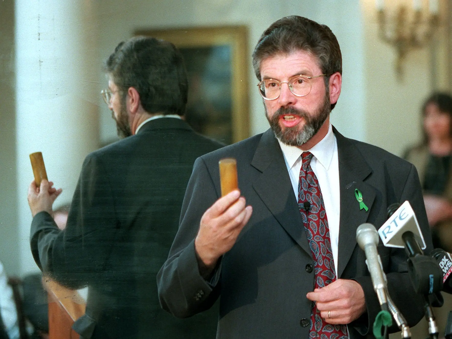 Sinn Fein President Gerry Adams holds up a rubber bullet during a speech to the American Irish Historical Society in New York, May 1998.