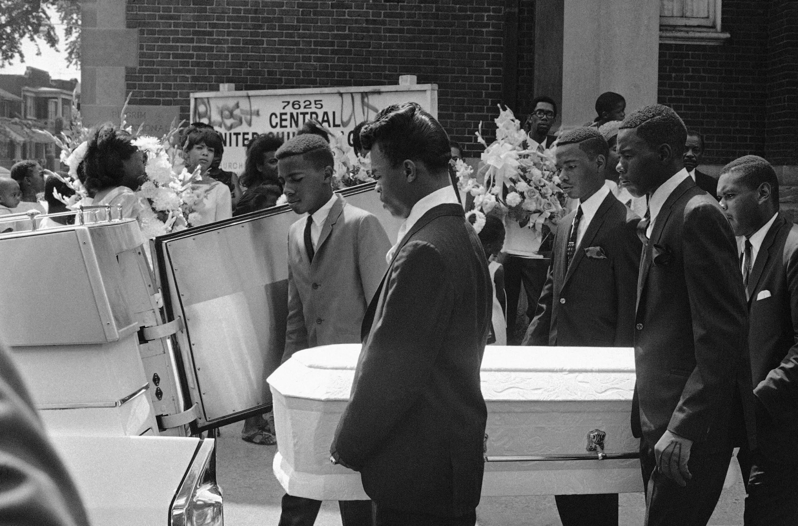 Pallbearers carry the tiny casket of four-year-old Tanya Blanding, a victim of Detroit's riots on August 1, 1967.