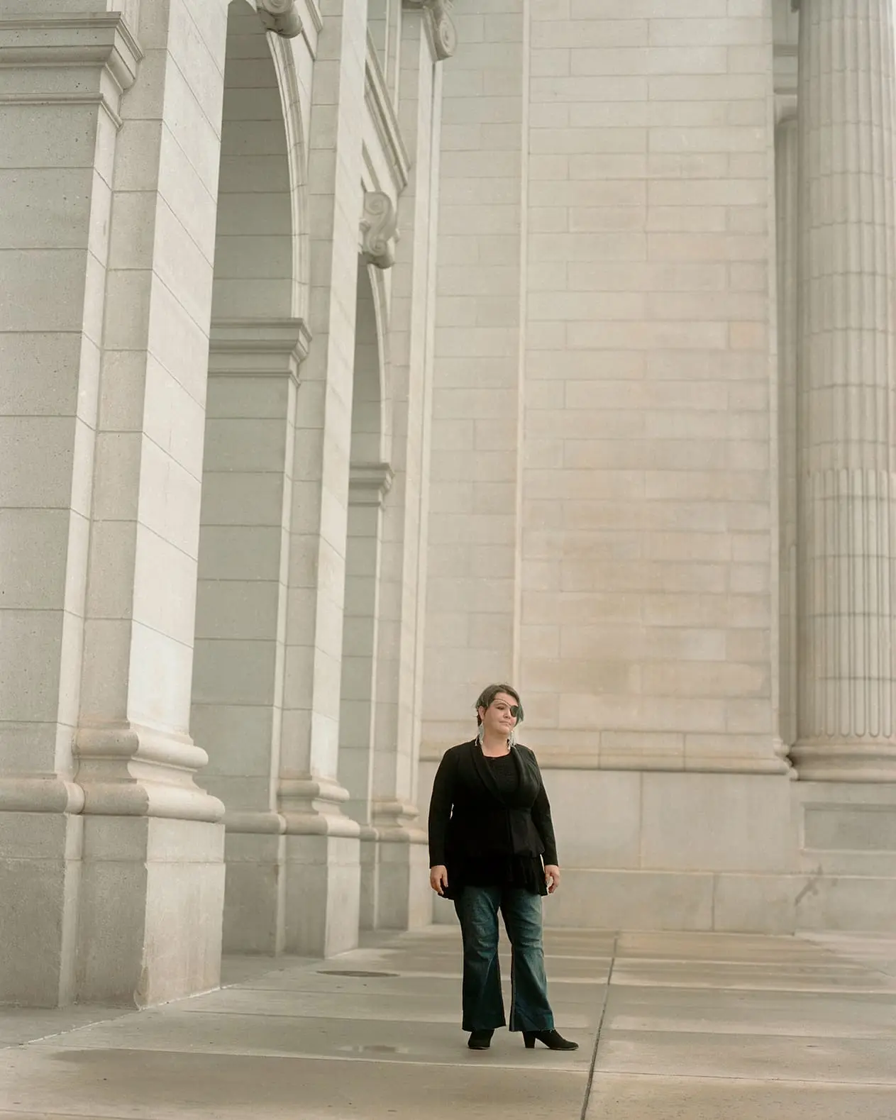 Linda Tirado stands outside Washington, D.C.'s Union Station in 2022. After being shot in the eye with a 40mm foam-tipped bullet, she was left half blind and suffering from a traumatic brain injury.